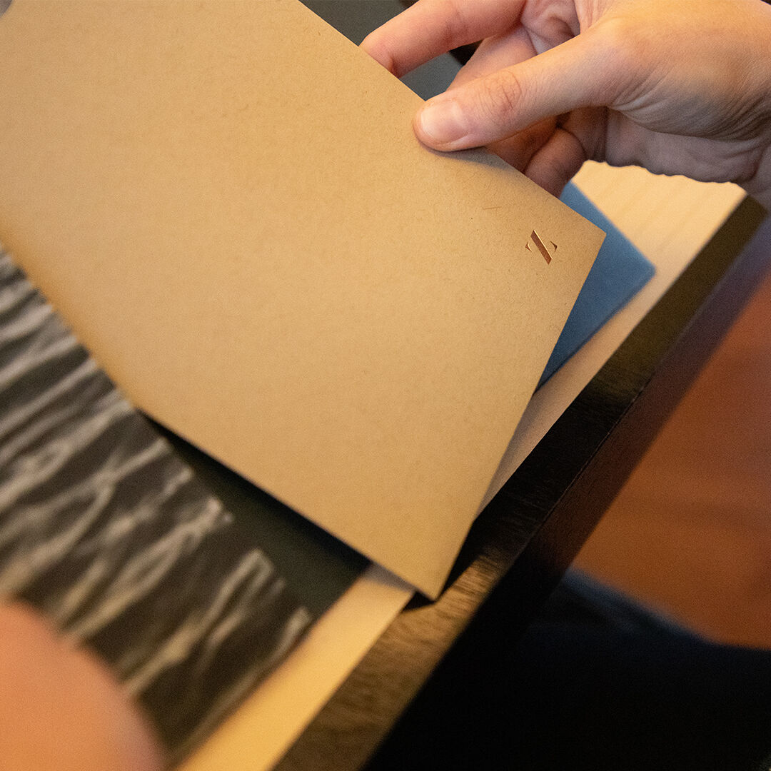 Zena Crown Tasting Folio being pulled out. Zena Crown Tasting Folio being pulled out.